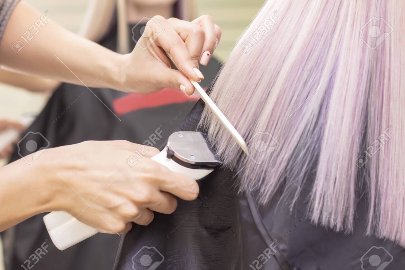 cutting hair with a machine