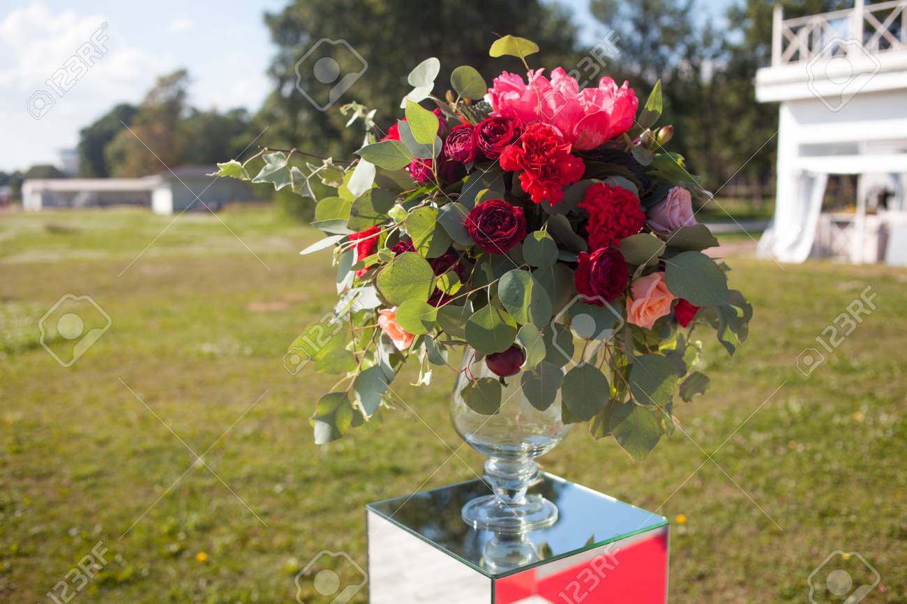 Wedding decor. Wedding registration outdoor. Luxury bouquets with red flowers - 85395107 Wedding decor. Wedding registration outdoor. Luxury bouquets with red flowers - 85395107