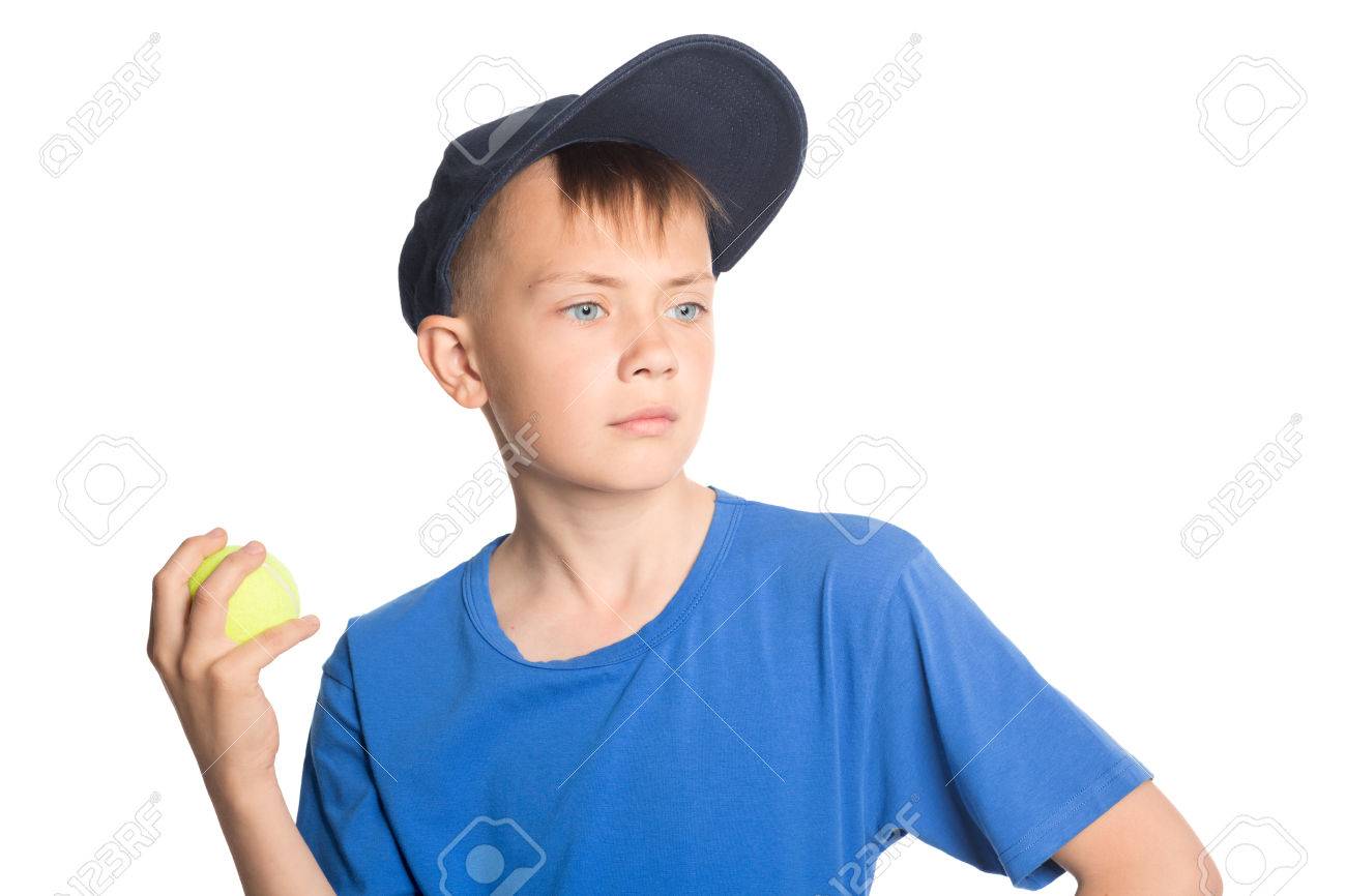 Serious Boy Holding A Tennis Ball Stock Photo Picture And Royalty Free Image Image