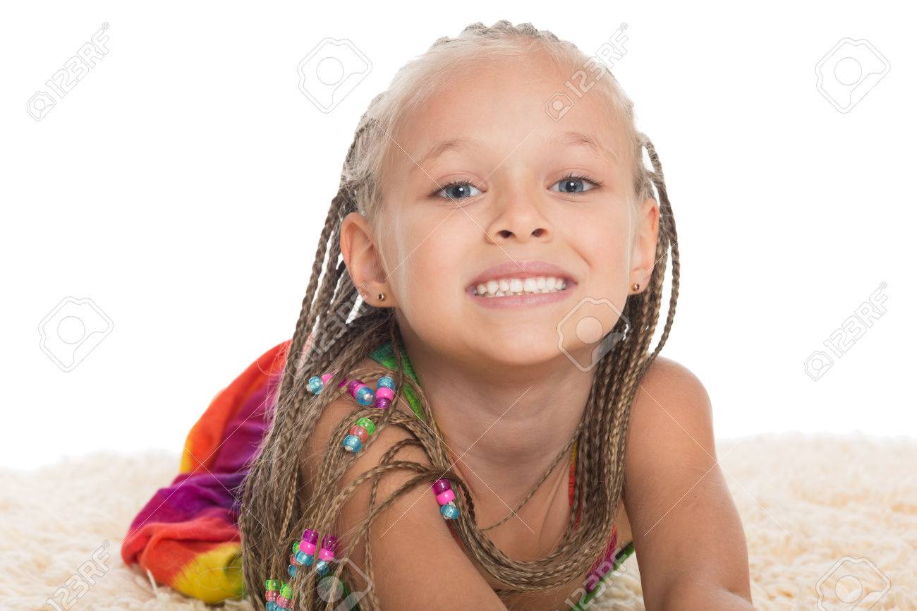 Pretty Little Girl With Dreadlocks On The Mat