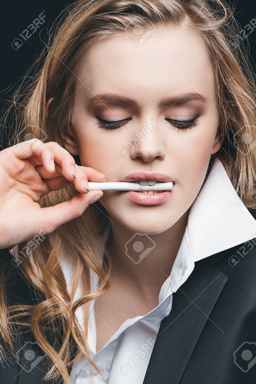 biting cigarette Girl Bite Cigarette Stock Photo, Picture and Royalty Free Image. Image  79232370