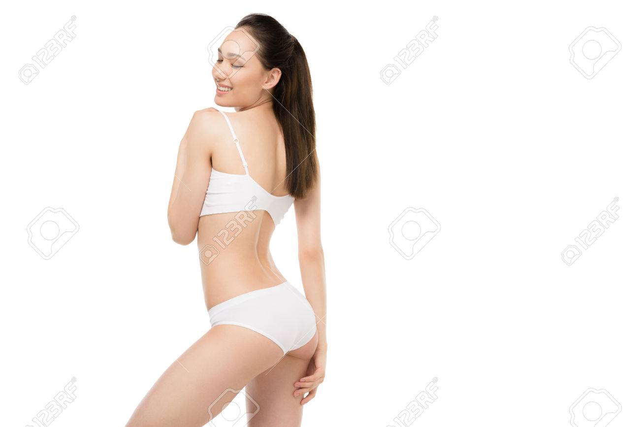 Elegant Asian Girl Posing In White Underwear Isolated On White Stock Photo,  Picture and Royalty Free Image. Image 80922663.