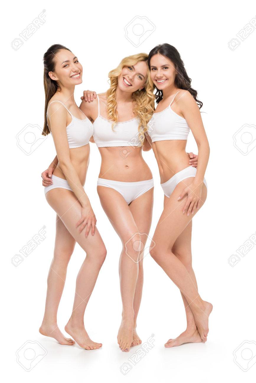Jóvenes Sonrientes A Mujeres En Ropa Interior Aislado En Blanco Fotos, Retratos, Imágenes Y Fotografía De Archivo Libres De Derecho. 80922833.
