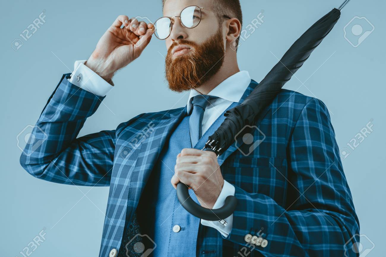 attractive man in suit with umbrella - 86378667 attractive man in suit with umbrella - 86378667
