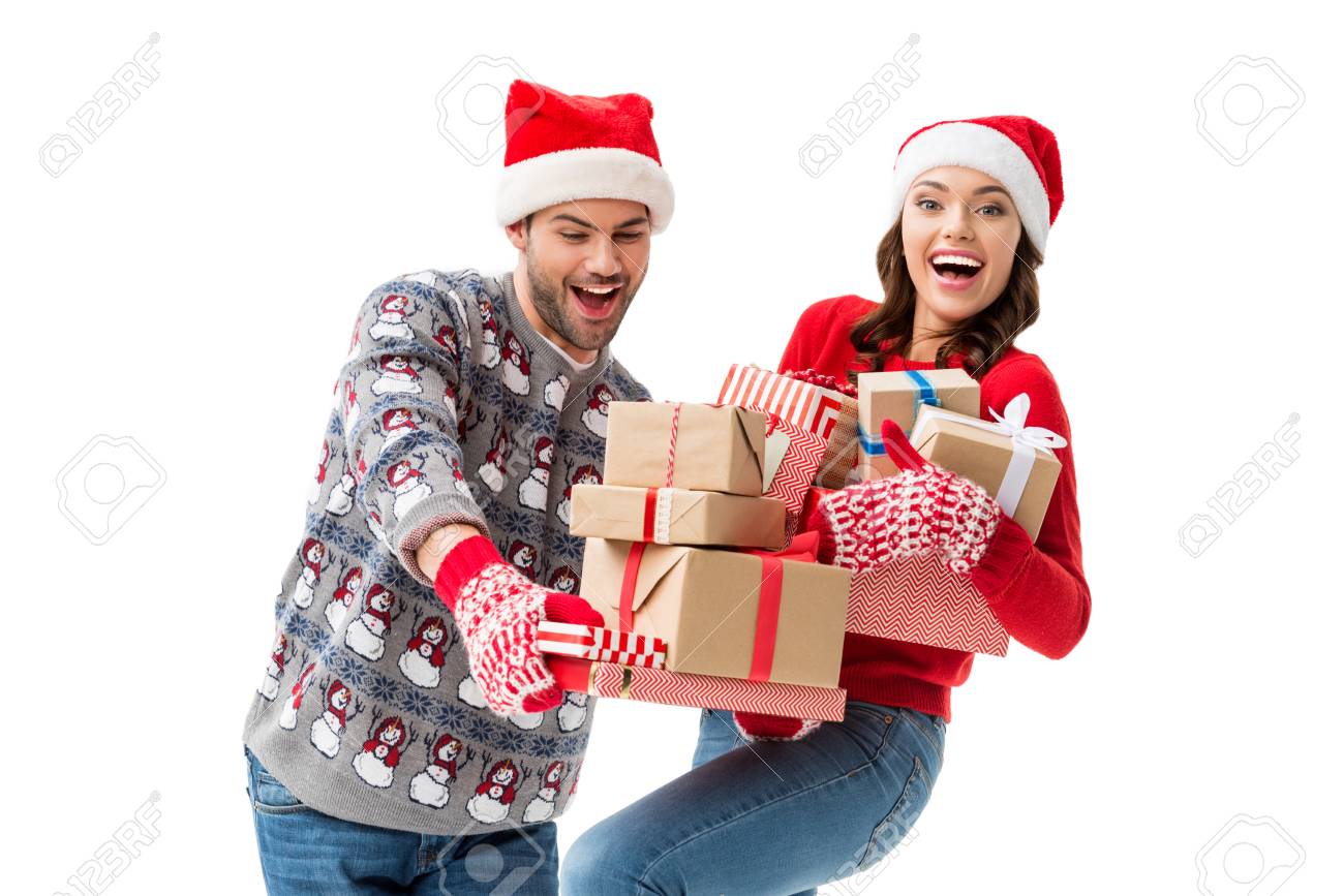 young couple holding christmas