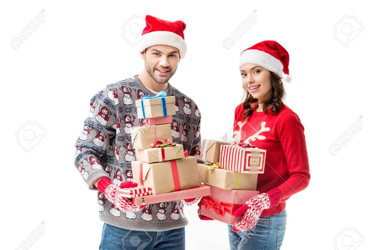 young couple holding christmas