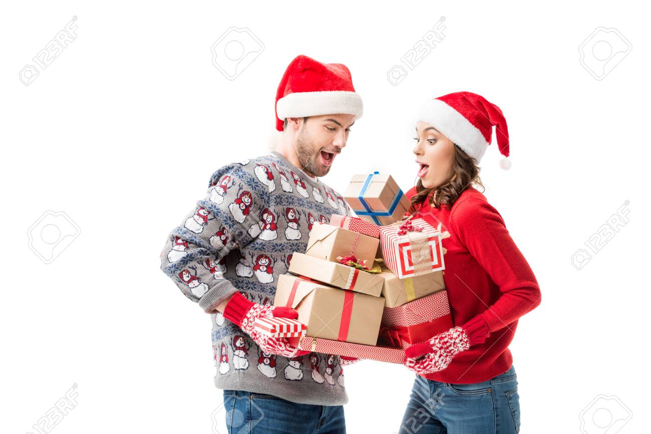 young couple holding christmas
