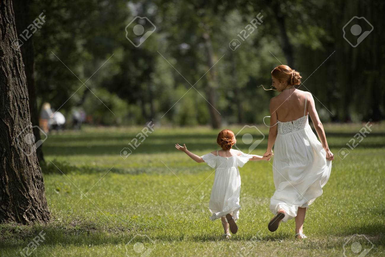 mother and daughter white dresses