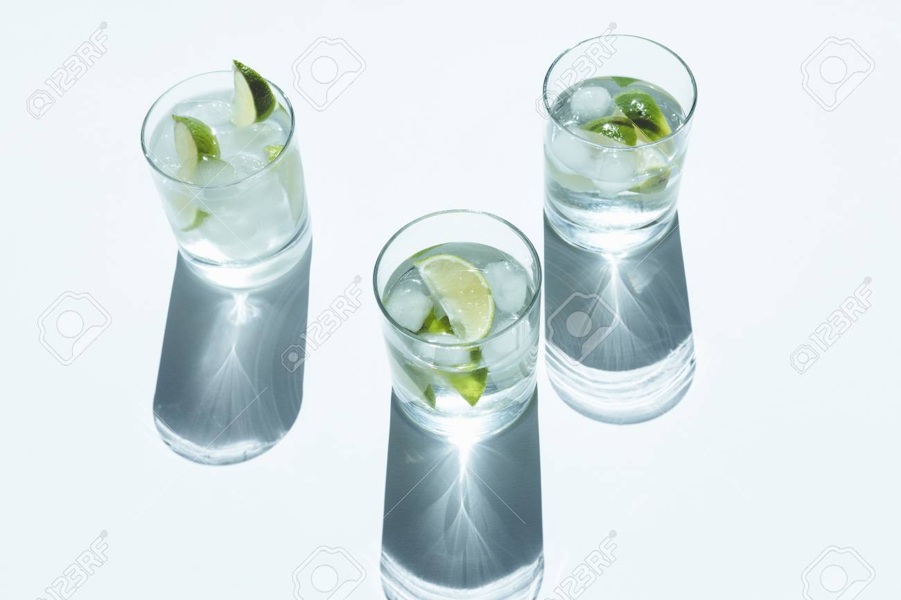 Download Close Up View Of Cool Gin Tonic Cocktail With Lime In Glasses Stock Photo Picture And Royalty Free Image Image 102612487