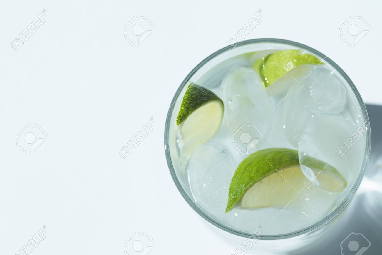 Download Top View Of Gin Tonic Cocktail With Lime And Ice Cubes In Glass Stock Photo Picture And Royalty Free Image Image 102611562 Yellowimages Mockups