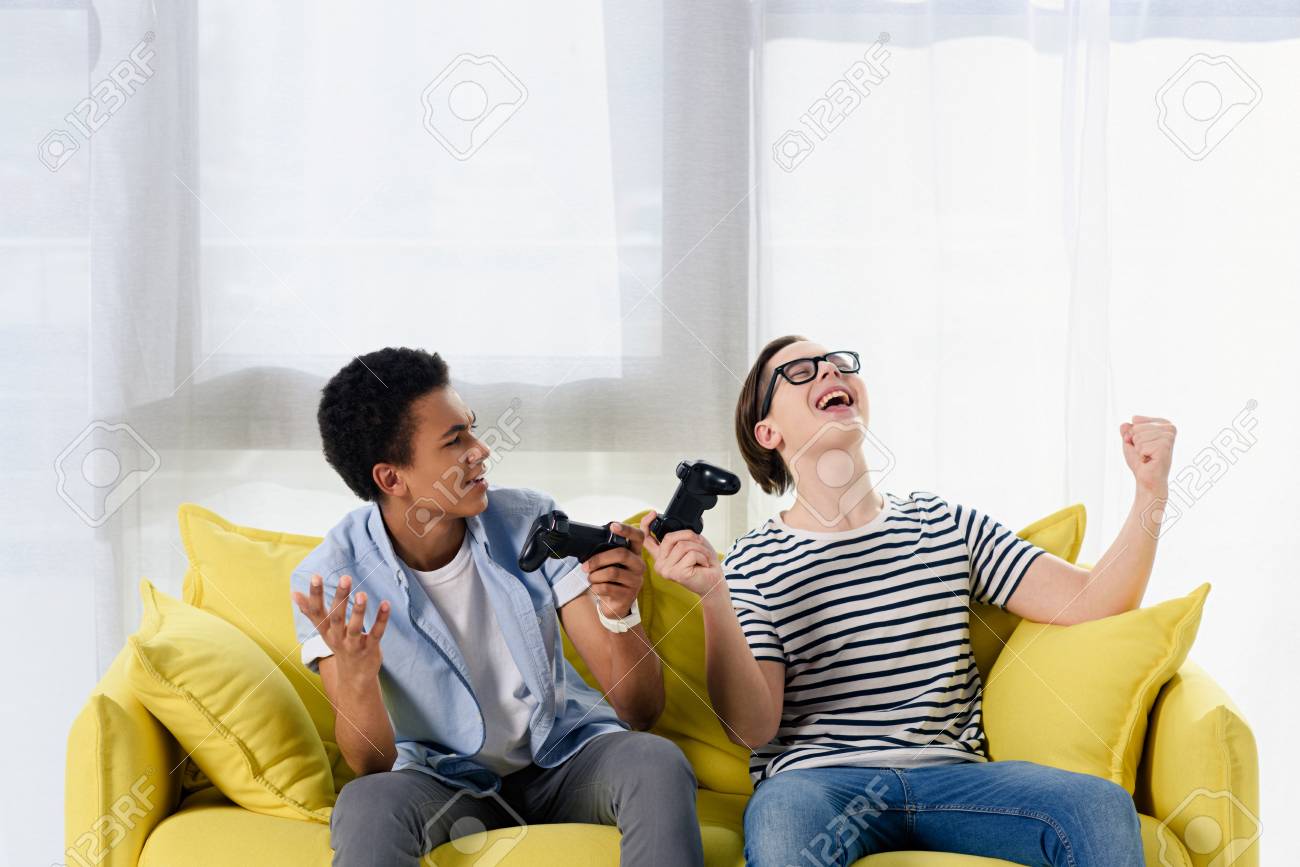 Multicultural Teen Boys Showing Yes