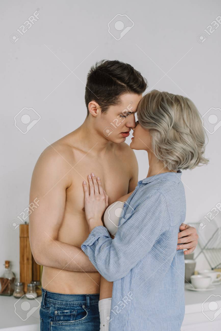 Seductive Half Naked Couple Kissing At Kitchen Stock Photo Seductive Half Naked Couple Kissing At Kitchen Stock Photo