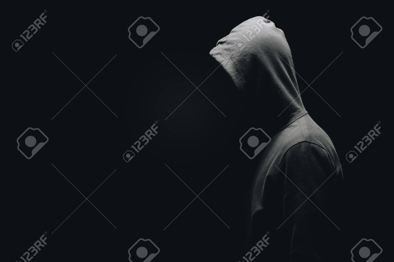 Side View Of Unrecognizable Man In Man Standing Isolated On Black Stock  Photo, Picture and Royalty Free Image. Image 111598496., image size:1300x867