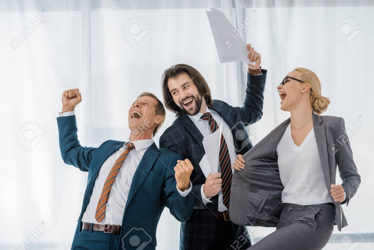 Happy Office Workers Rejoicing Great Deal In Office Stock Photo, Picture  And Royalty Free Image. Image 111826608.