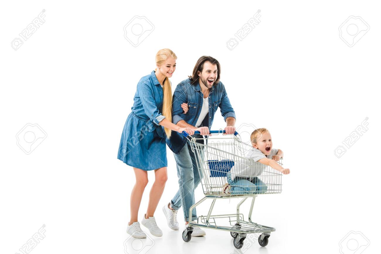 Happy parents riding their son on the shopping cart and having fun isolated of white - 112164047 Happy parents riding their son on the shopping cart and having fun isolated of white - 112164047