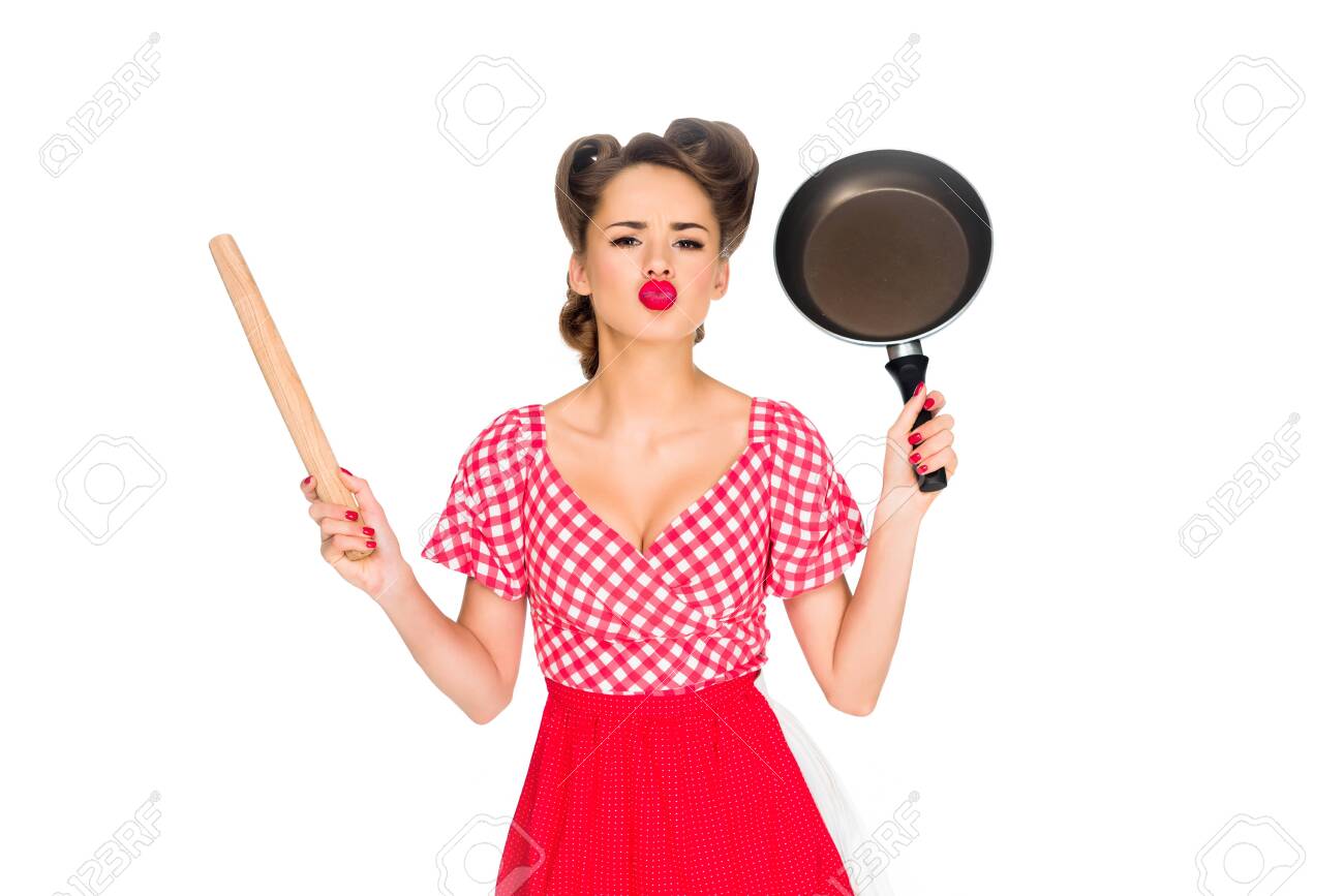 Stylish Woman In Retro Clothing With Rolling Pin And Frying Pin en retro clothing