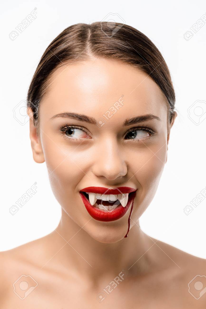 Smiling Naked Girl With Red Lips, Vampire Fangs And Blood On Face Looking  Away Isolated On White Stock Photo, Picture and Royalty Free Image. Image  118483345.
