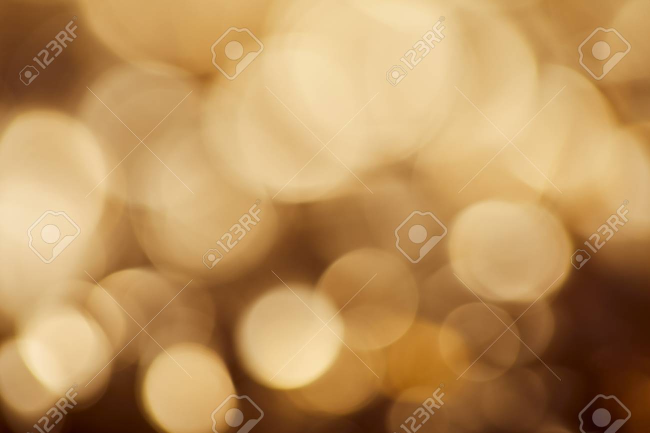 Bright Brown Background With Golden Sparkling Lights Stock Photo Picture And Royalty Free Image Image