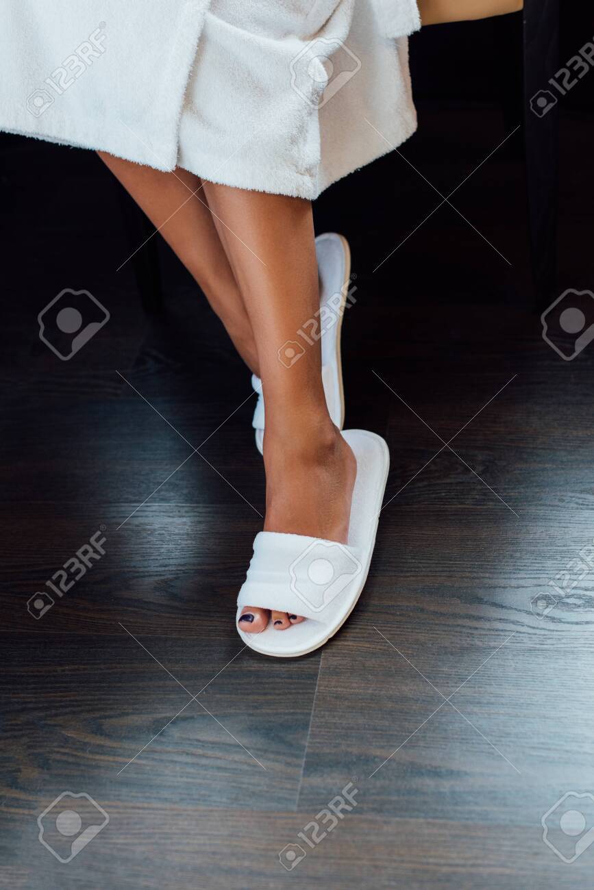 white hotel slippers