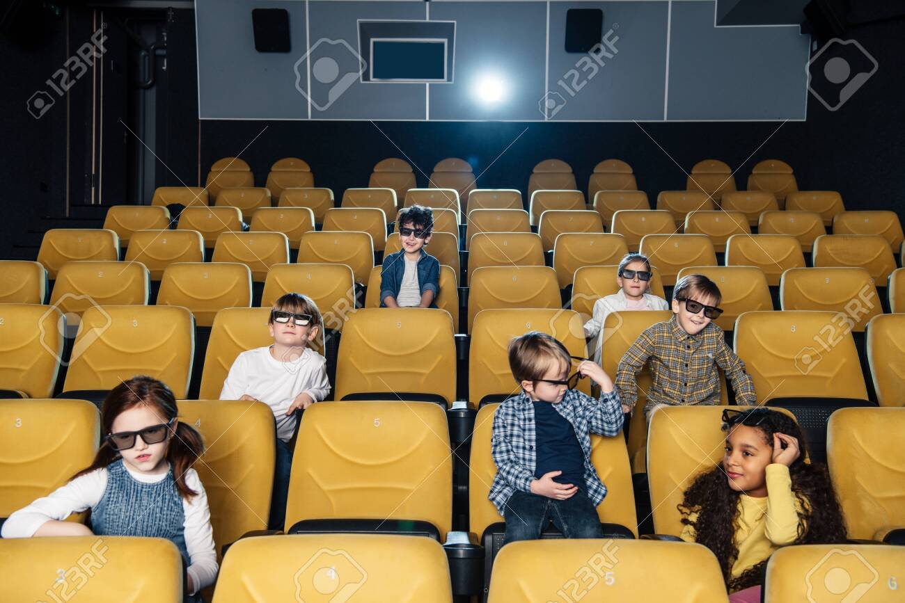 Cute Children In 3d Glasses Sitting In Cinema Hall Together Stock Photo Picture And Royalty Free Image Image