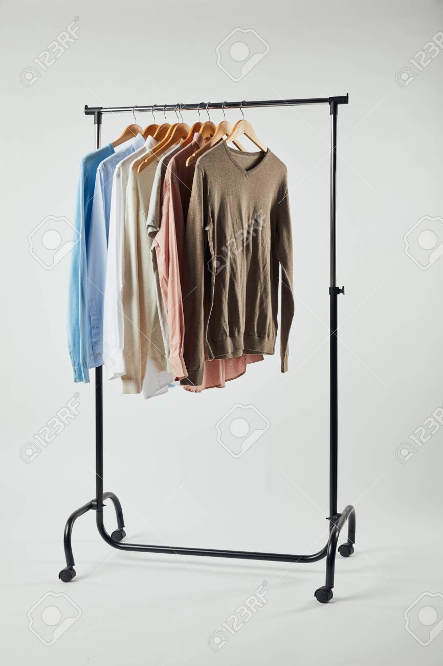 wooden clothing rack on Straight Rack Wooden Hangers And Male Clothes Isolated On Grey Stock Photo Picture And Royalty Free Image Image 120973994