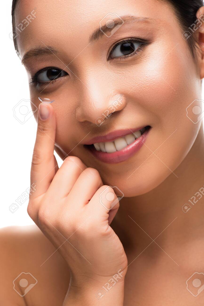 Happy attractive Asian girl with contact lens, isolated on white background - 126606894 Happy attractive Asian girl with contact lens, isolated on white background - 126606894
