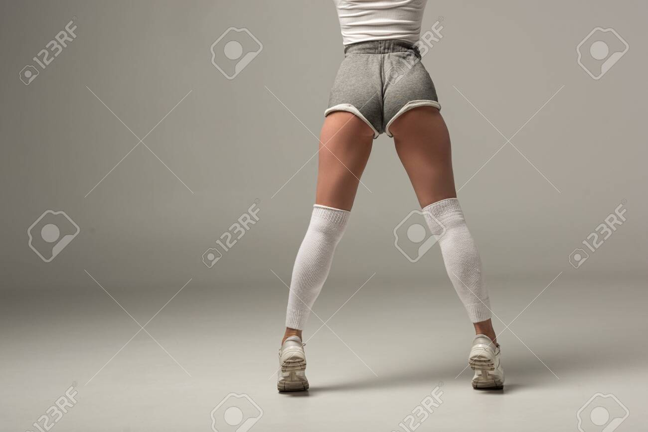 Back View Of Young Sexy Girl In Shorts Twerking On White Background Stock  Photo, Picture and Royalty Free Image. Image 135689868.