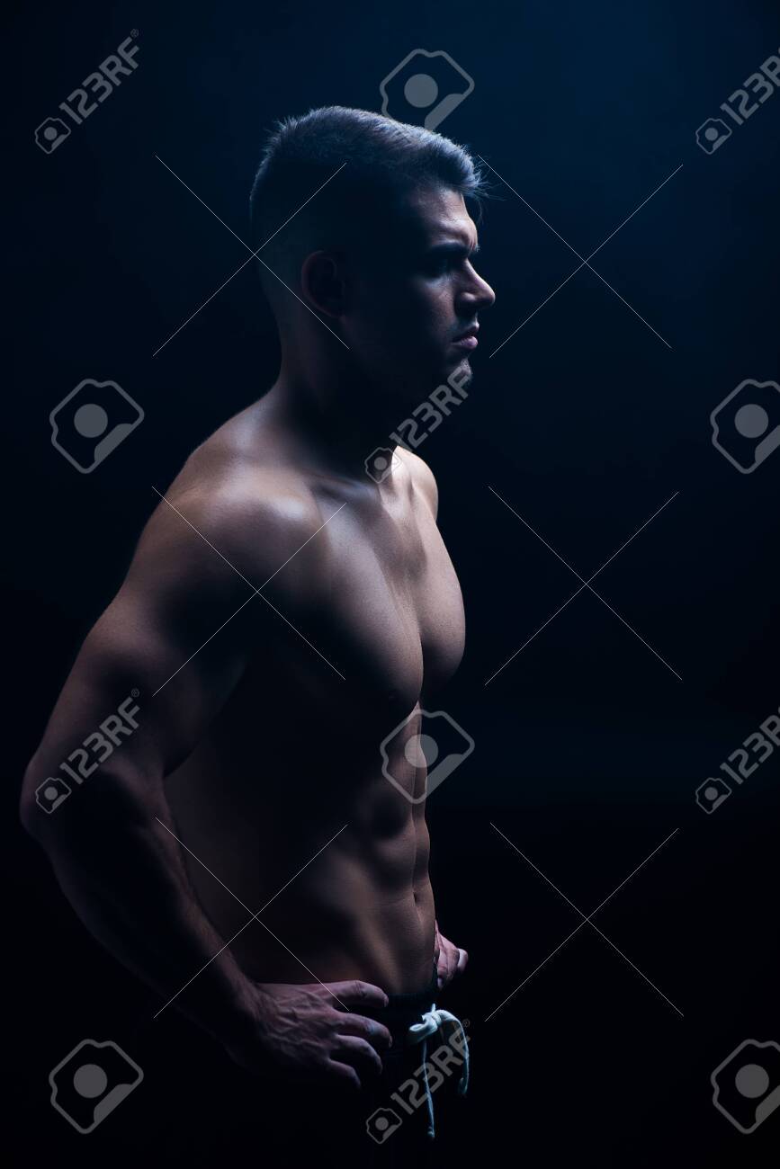Side View Of Sexy Muscular Bodybuilder With Bare Torso Posing Stock Photo Picture And Royalty Free Image Image 136965967