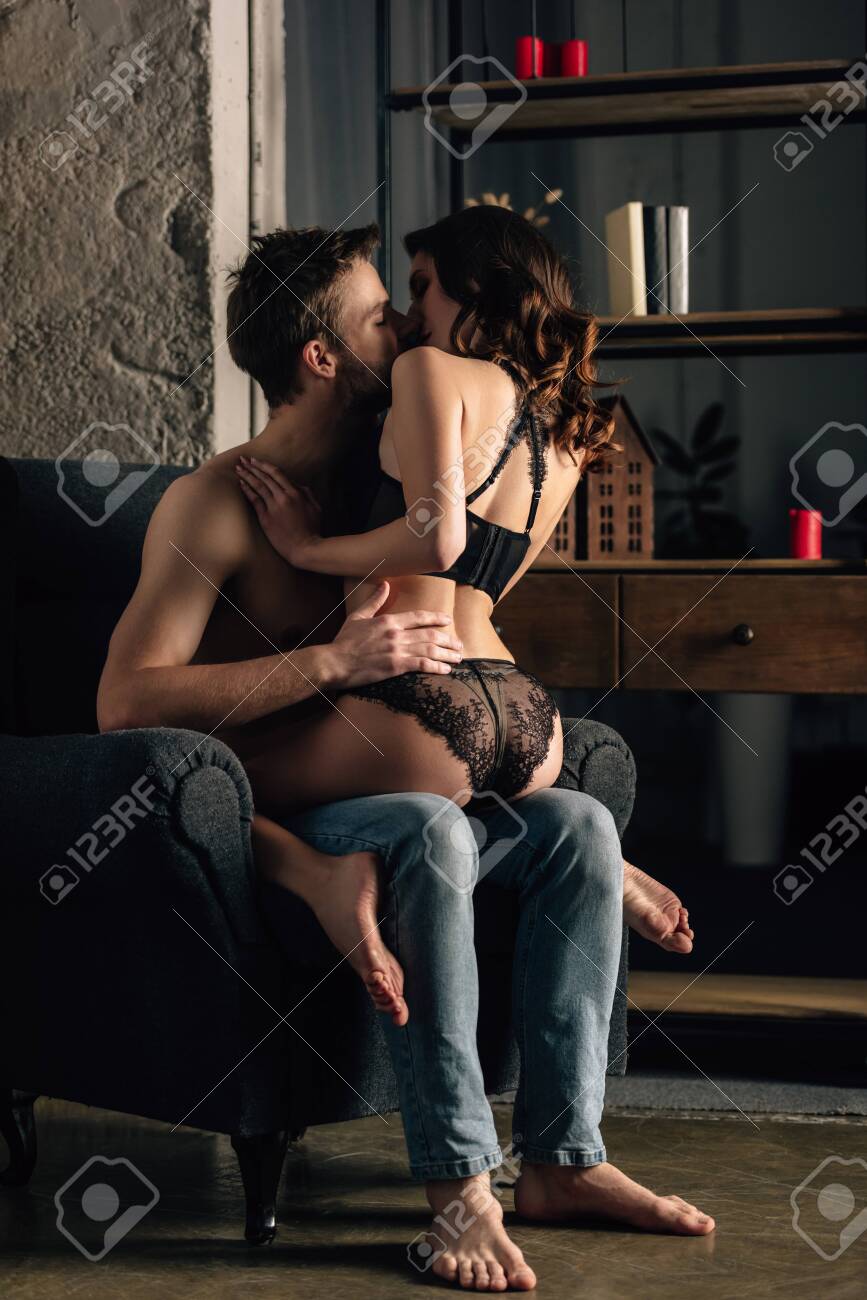 Girlfriend In Black Underwear Kissing And Hugging With Boyfriend Stock  Photo, Picture and Royalty Free Image. Image 140494007.