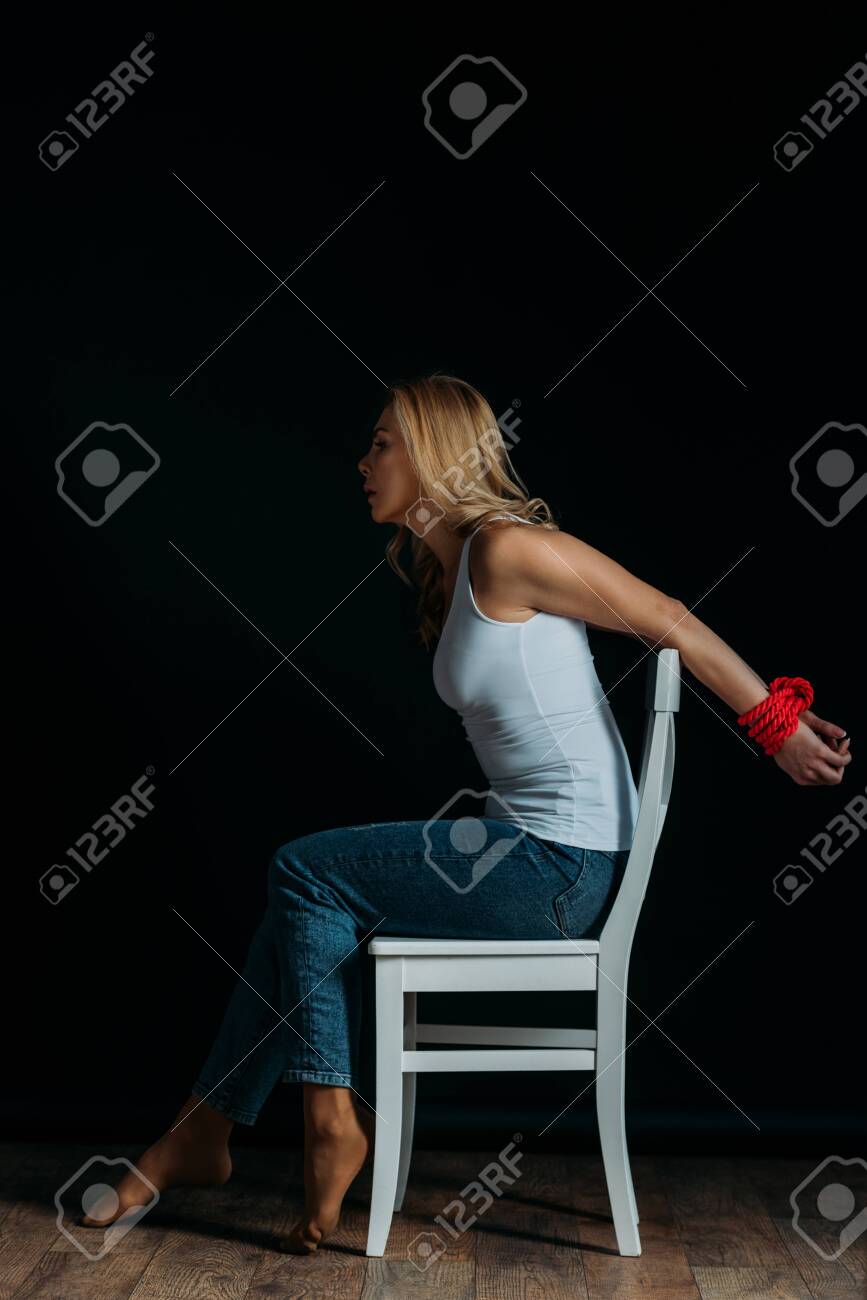 Chair On Black Background Stock Photo photo