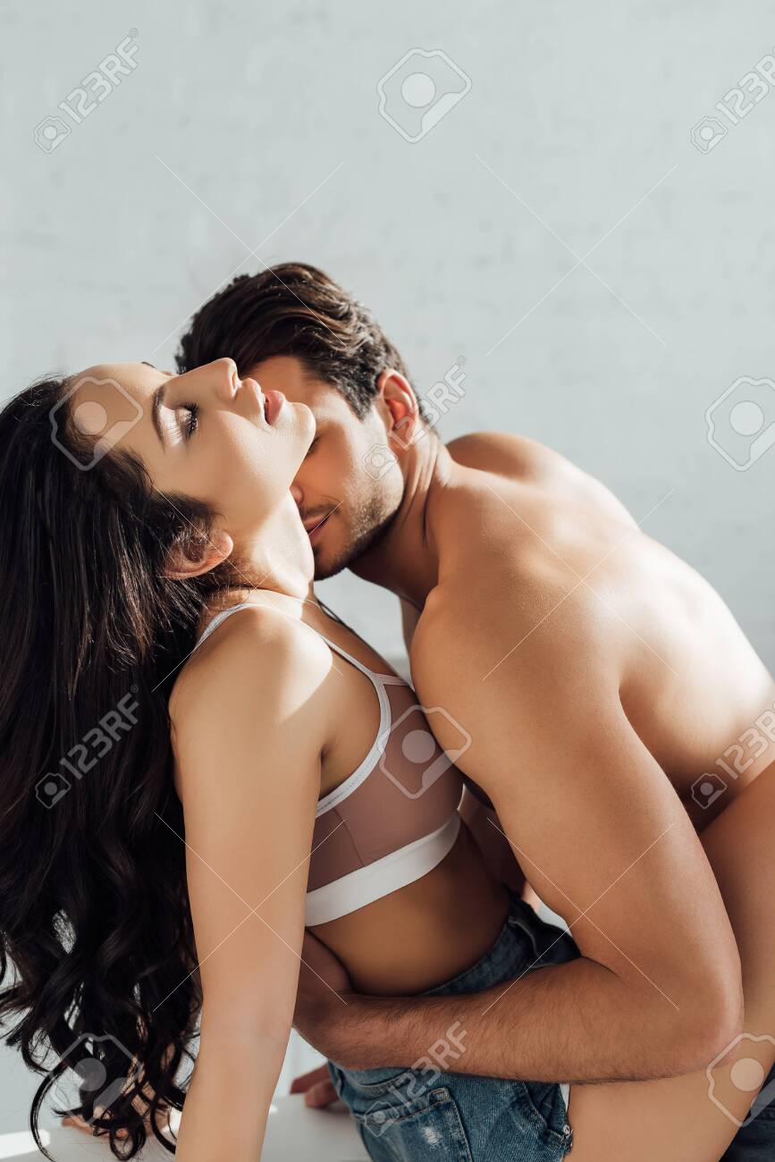 Hot Girl With Closed Eyes Hugging With Boyfriend Stock Photo, Picture and  Royalty Free Image. Image 145634879.