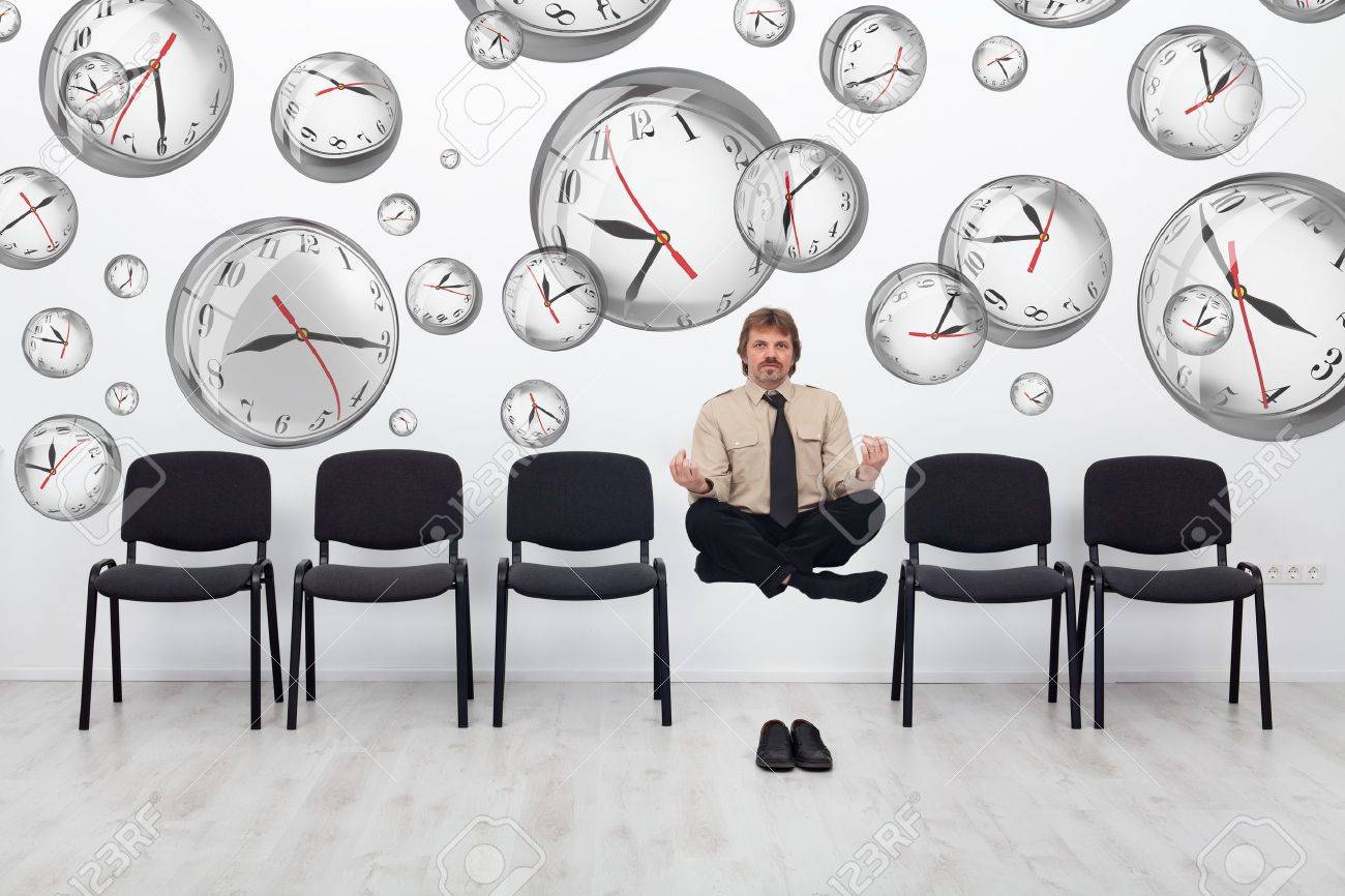 Project manager juggling with deadlines - surrounded by distorted wall clock bubbles - 18162647 Project manager juggling with deadlines - surrounded by distorted wall clock bubbles - 18162647