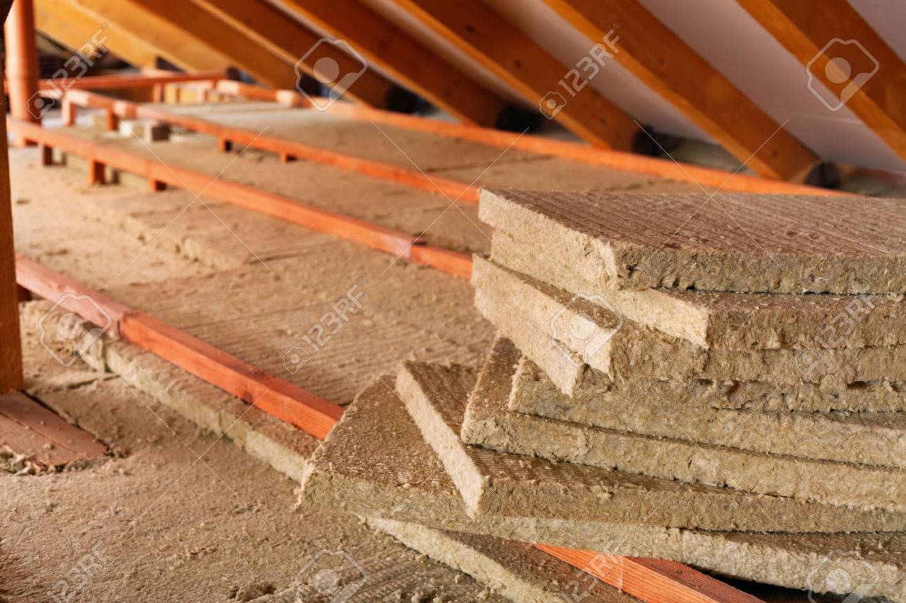 Mineral wool stack on construction site - thermal insulation of a house - 35647516 Mineral wool stack on construction site - thermal insulation of a house - 35647516
