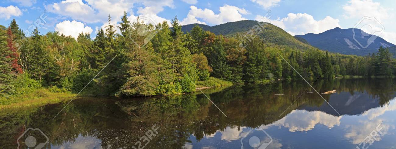 Panoramic view from Marcy Dam in the High Peaks region of the Adirondack Mountains of New York - 11545880 Panoramic view from Marcy Dam in the High Peaks region of the Adirondack Mountains of New York - 11545880