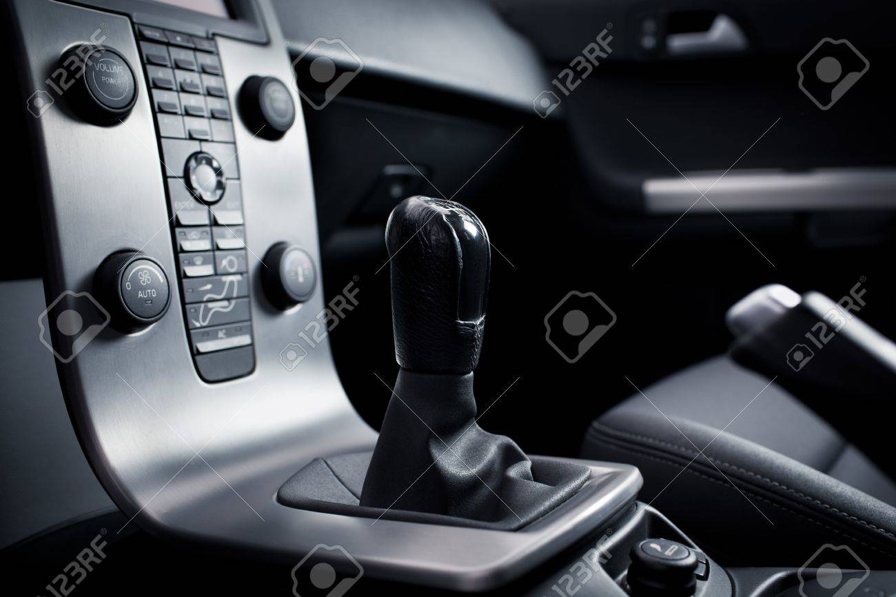 interior of a modern car dashboard with gear lever stock photo