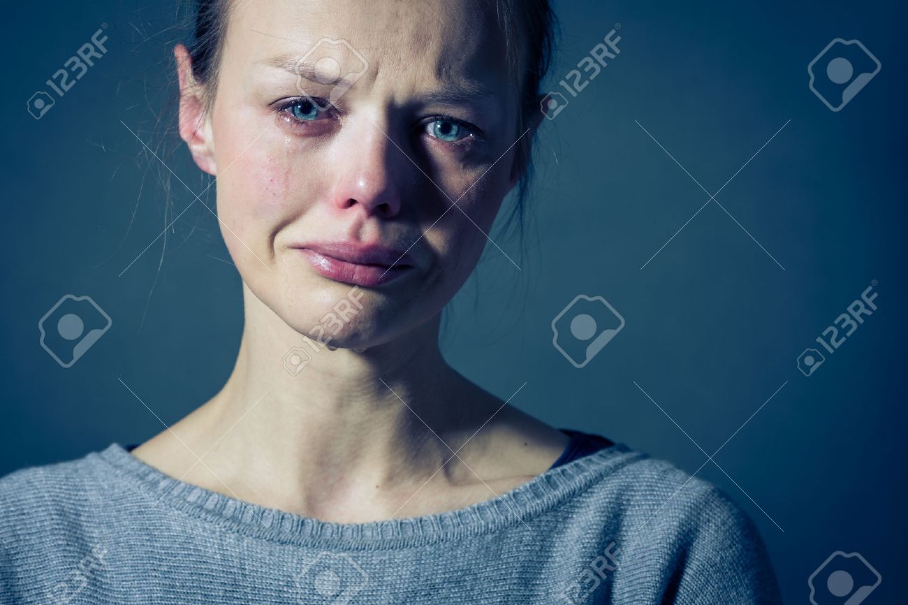 Young woman suffering from severe depression/anxiety/sadness, crying, tears coming from her eyes - 51207852 Young woman suffering from severe depression/anxiety/sadness, crying, tears coming from her eyes - 51207852