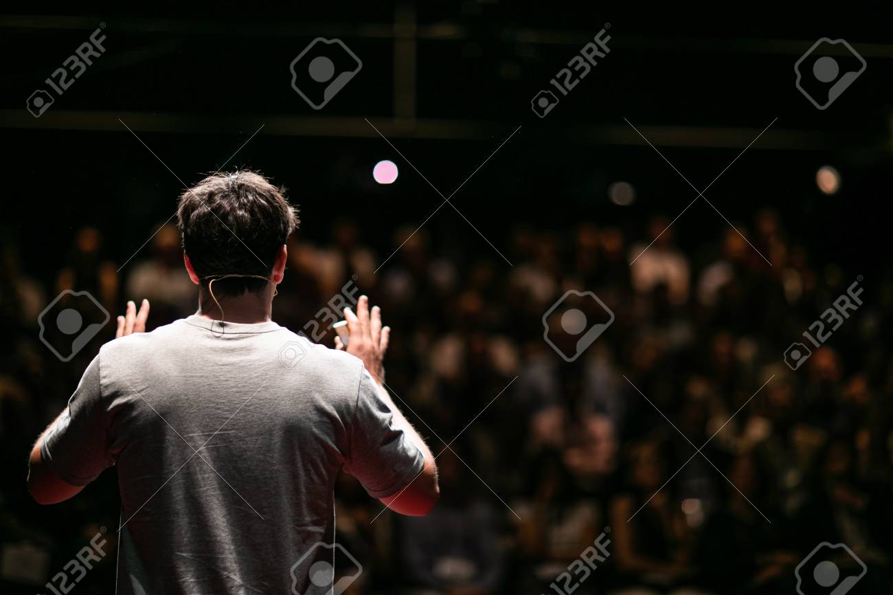 Speaker giving a talk on corporate Business Conference. Audience at the conference hall. Business and Entrepreneurship event. - 108985130 Speaker giving a talk on corporate Business Conference. Audience at the conference hall. Business and Entrepreneurship event. - 108985130