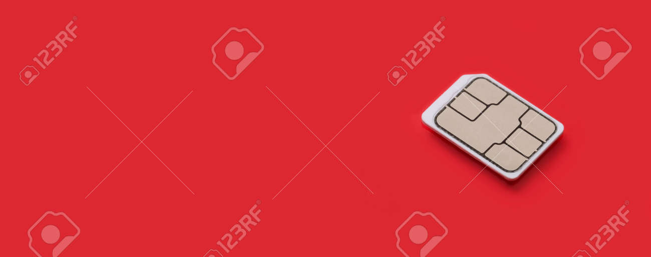 SIM Card - Isolated on red background. banner size, panorama, with copyspace for your individual text. - 163888796 SIM Card - Isolated on red background. banner size, panorama, with copyspace for your individual text. - 163888796