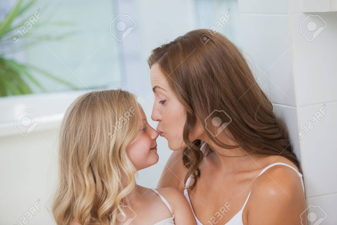 nudist mom daughter grandmother Close-up Side View Of A Mother Kissing On Daughter's Nose At Home Stock  Photo, Picture and Royalty Free Image. Image 28042177.