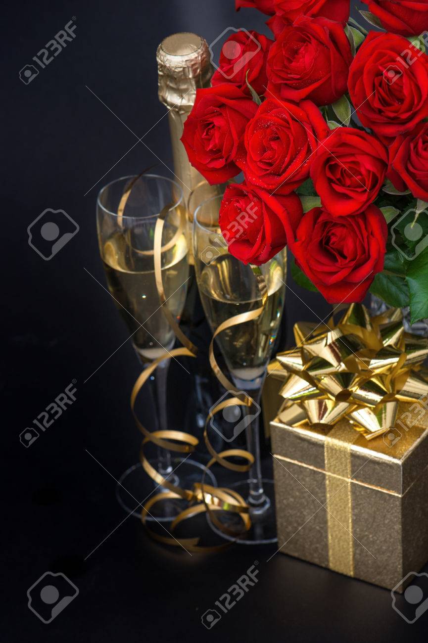 Red Roses Golden Gift And And Champagne On Black Background Festive Flower Arrangement Selective Focus Stock Photo Picture And Royalty Free Image Image Red Roses Golden Gift And And Champagne On Black Background Festive Flower Arrangement Selective Focus Stock Photo Picture And Royalty Free Image Image
