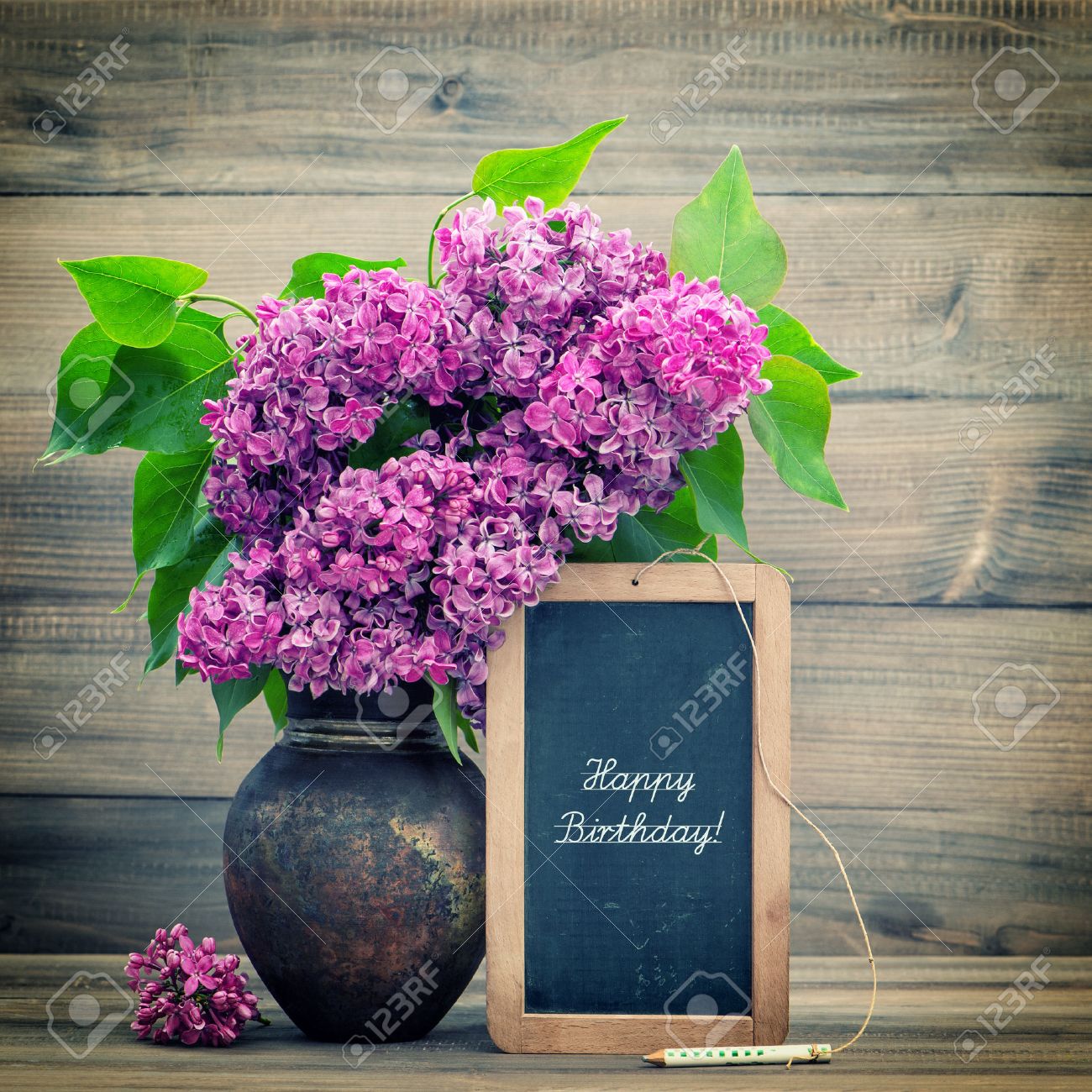 Bouquet Of Lilac Flowers On Wooden Blackboard With Sample Text Happy Birthday Retro Style Toned Picture Stock Photo Picture And Royalty Free Image Image Bouquet Of Lilac Flowers On Wooden Blackboard With Sample Text Happy Birthday Retro Style Toned Picture Stock Photo Picture And Royalty Free Image Image