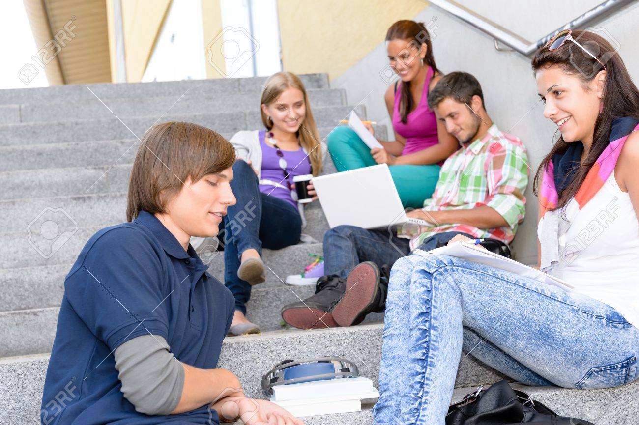 students relaxing on high school steps in break teens young college teens collage
