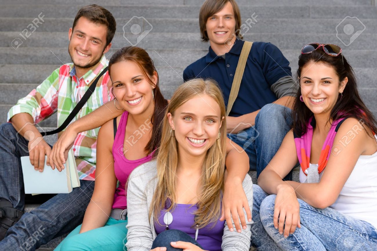 students sitting on school stairs smiling teens campus college teens collage
