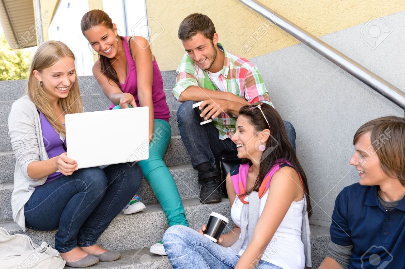 students having fun with laptop school stairs teens college laughing teens collage