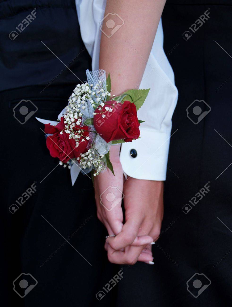 Red Rose Wrist Corsage With Babies Breath And Blue And White