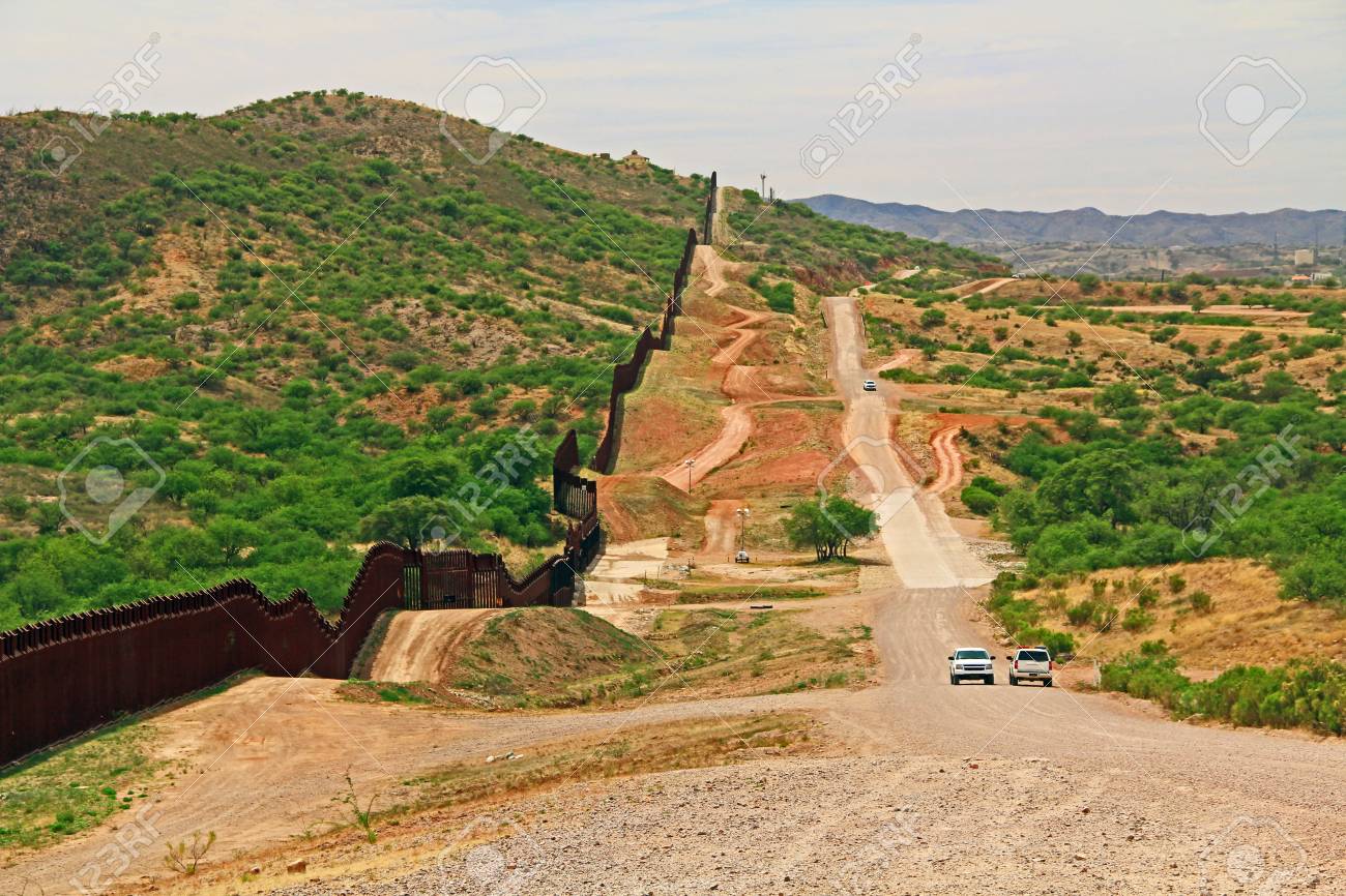 Border Fence Beside A Road Near Nogales, Arizona Separating The United  States From Mexico With Border Patrol Vehicle. Stock Photo, Picture and  Royalty Free Image. Image 115211636., image size:1300x866