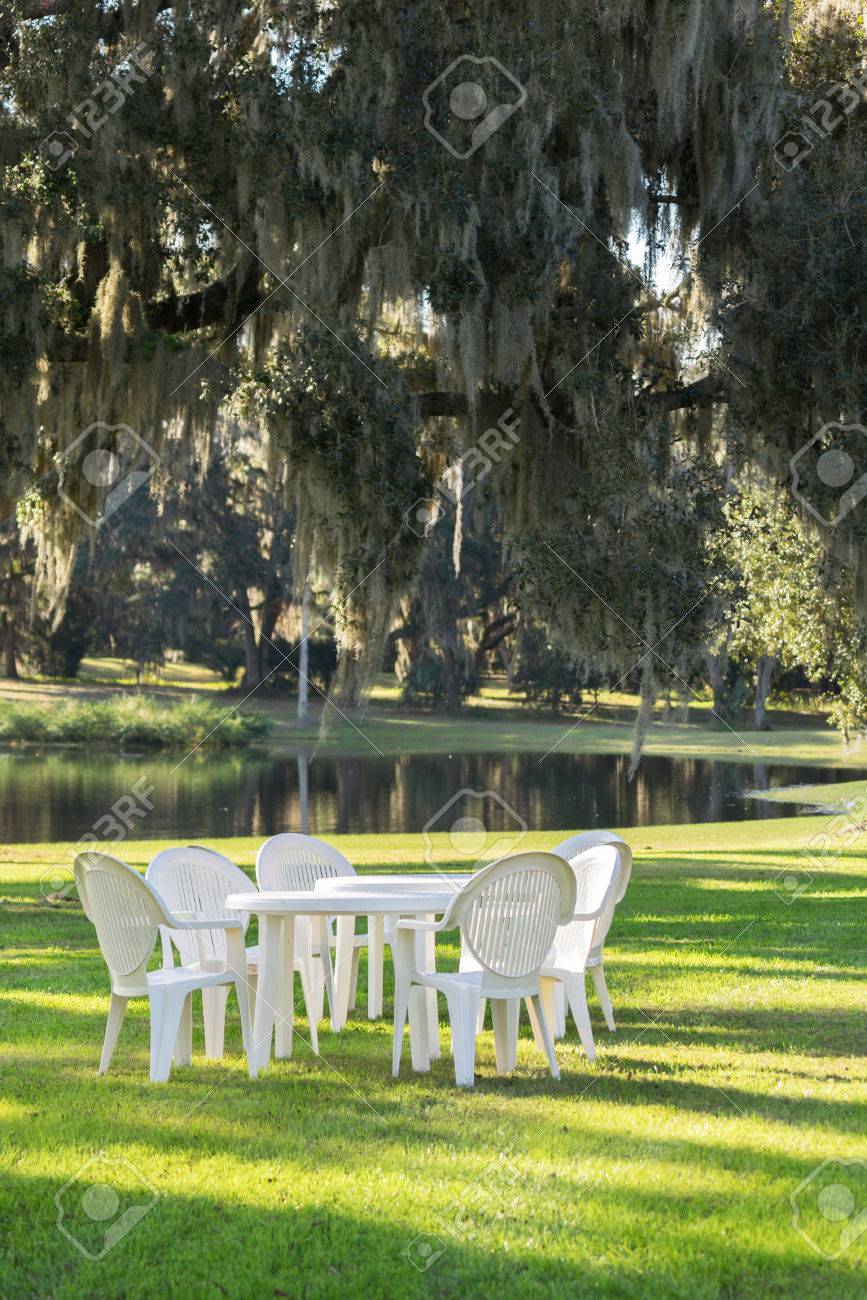 white plastic table and chairs