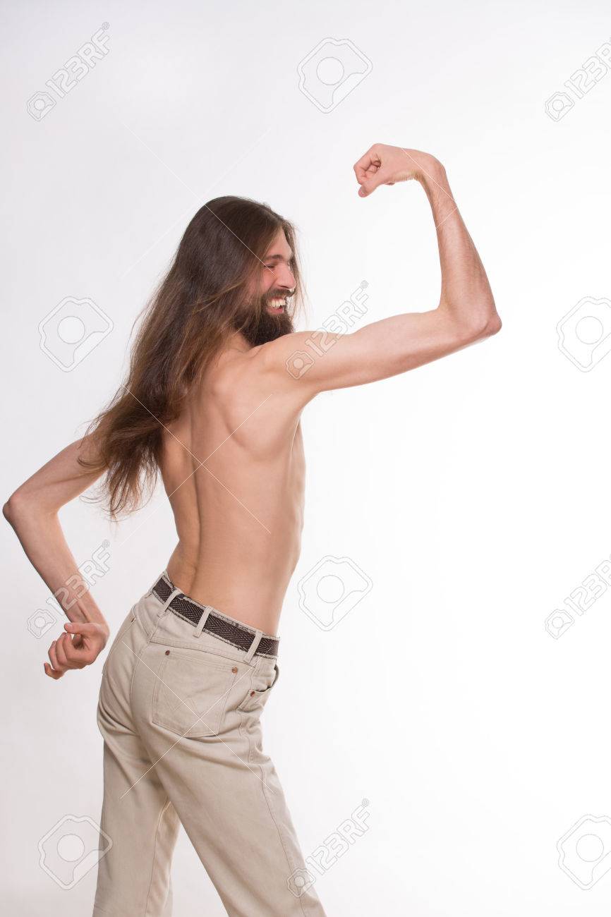 Langhaarige Starke Mann Zeigt Seine Bicepts Sehr Dunne Modell Isoliert Auf Weissem Hintergrund Lizenzfreie Fotos Bilder Und Stock Fotografie Image 41224464