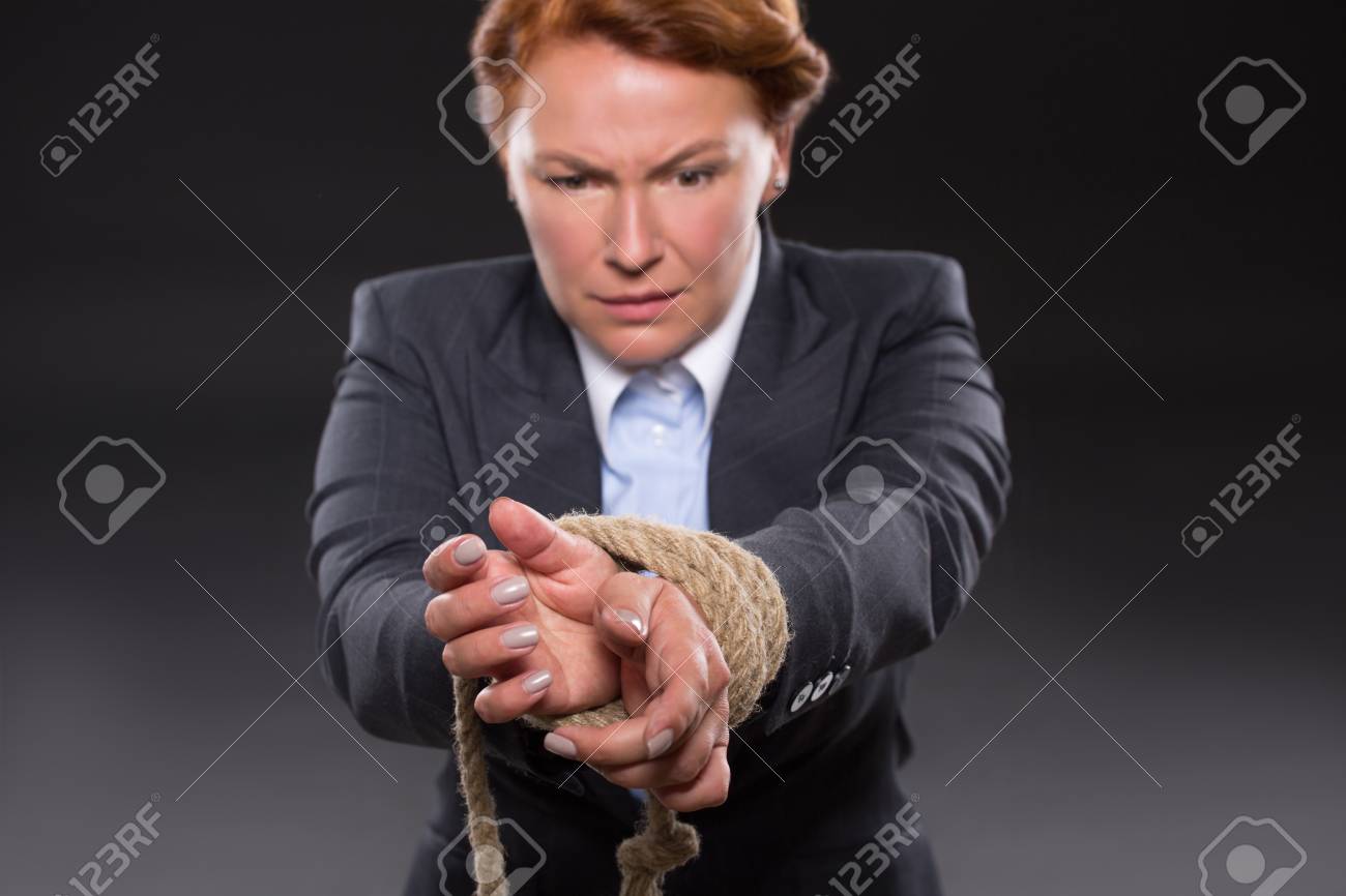 her thumbs were tied together Her thumbs were tied together