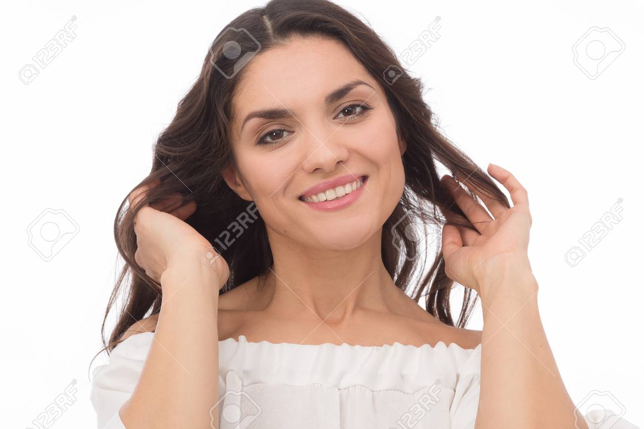 Young Female Brunette Smiling On Camera And Touching Her Curly Hair Mid Age Woman Over 35 Years Old Beauty Concept Stock Photo Picture And Royalty Free Image Image